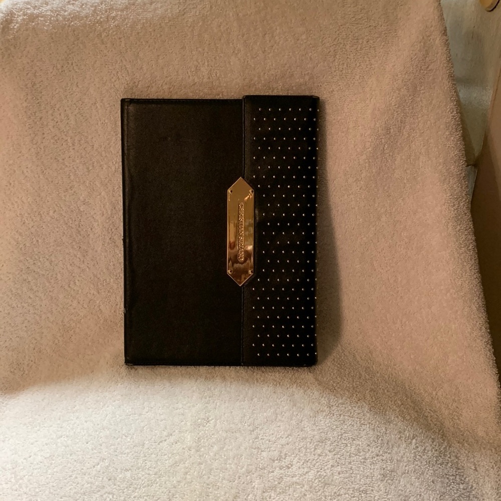 Black  Christian Siriano iPad case.